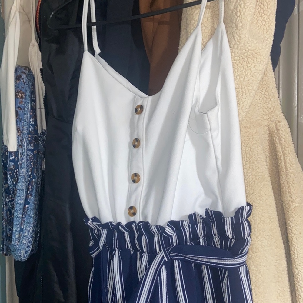 It’s a romper with a little strapped teared but easy fix
